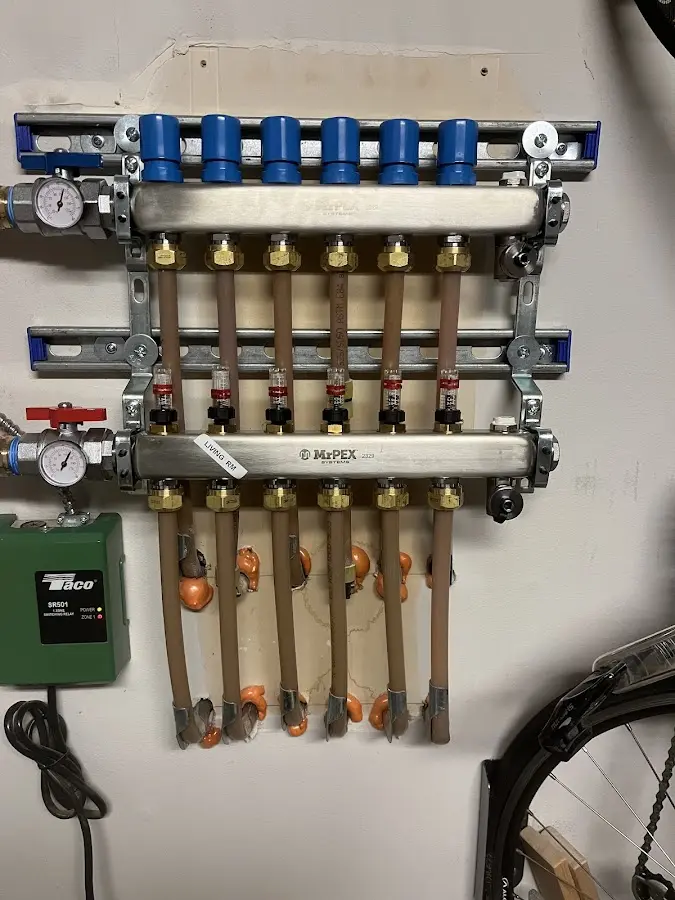 Plumber performing Water Heater Repair at a residential property in Granger